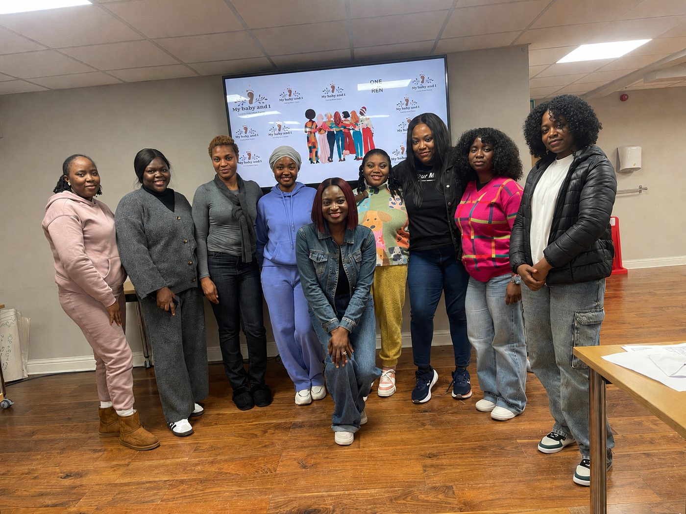 My Baby And I community gathering — group of women at a community event